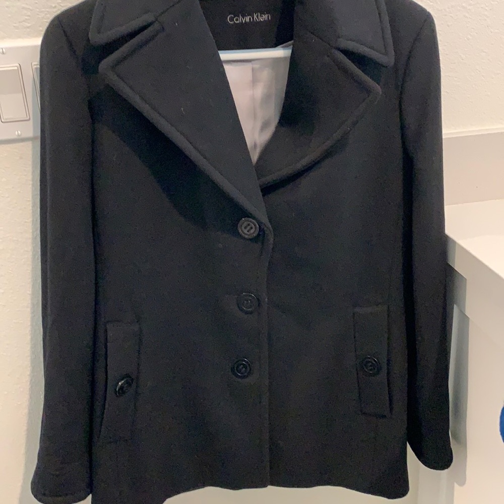 Winter black pea coat, like new. Worn once